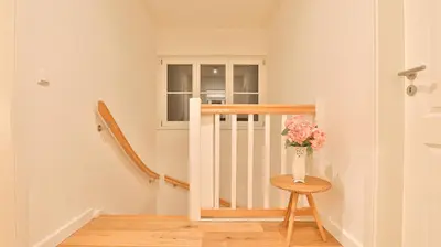 Ein Bett oder Betten in einem Zimmer der Unterkunft Traumgarten Villa Sanftmut