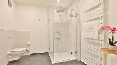 Ein Badezimmer in der Unterkunft Strandhaus Zingst Apartment 12