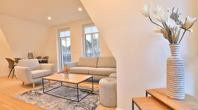 Ein Sitzbereich in der Unterkunft Strandhaus Zingst Apartment 14