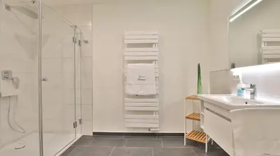 Ein Badezimmer in der Unterkunft Strandhaus Zingst Apartment 14