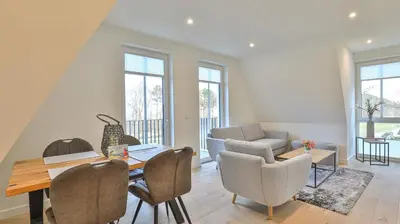 Ein Sitzbereich in der Unterkunft Strandhaus Zingst Apartment 14