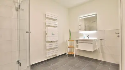 Ein Badezimmer in der Unterkunft Strandhaus Zingst Apartment 14