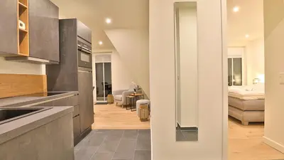 Ein Bett oder Betten in einem Zimmer der Unterkunft Strandhaus Zingst Apartment 15