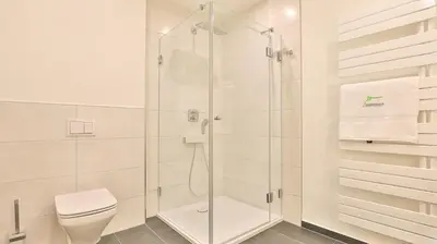 Ein Badezimmer in der Unterkunft Strandhaus Zingst Apartment 08