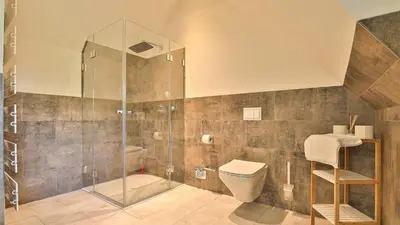 Ein Badezimmer in der Unterkunft Kapitänshaus Brücke