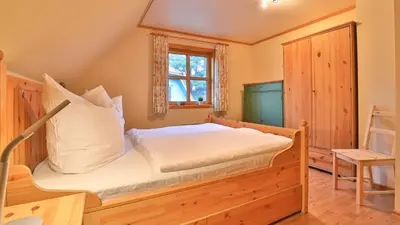 Ein Bett oder Betten in einem Zimmer der Unterkunft Heideröschen Park Heideröschen 7a