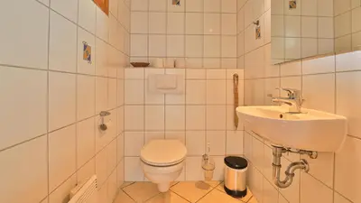 Ein Badezimmer in der Unterkunft Heideröschen Park Heideröschen 9