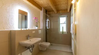 Ein Badezimmer in der Unterkunft Heideröschen Park Heideröschen 5b