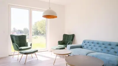 Ein Sitzbereich in der Unterkunft Apartmenthaus Wittsande Wittsande 04