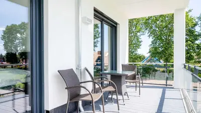 Ein Balkon oder eine Terrasse in der Unterkunft Apartmenthaus Wittsande Wittsande 04