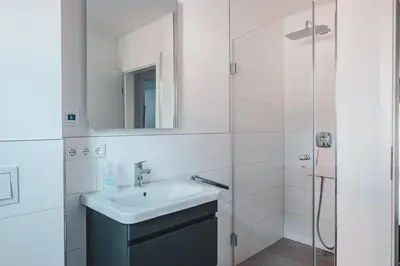 Ein Badezimmer in der Unterkunft Dünenquartier Apartment 02