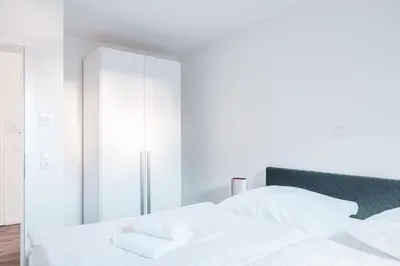 Ein Bett oder Betten in einem Zimmer der Unterkunft Dünenquartier Apartment 02