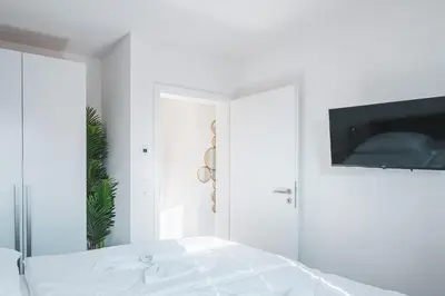 Ein Bett oder Betten in einem Zimmer der Unterkunft Dünenquartier Apartment 03