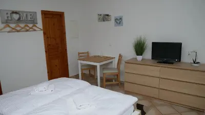 Ein Bett oder Betten in einem Zimmer der Unterkunft Windflüchter Nordstrand