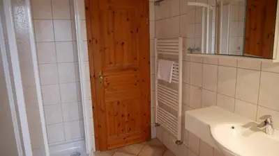 Ein Badezimmer in der Unterkunft Windflüchter Treibholz