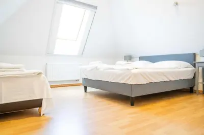 Ein Bett oder Betten in einem Zimmer der Unterkunft Windflüchter Brise