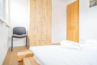 Ein Bett oder Betten in einem Zimmer der Unterkunft Windflüchter Hus