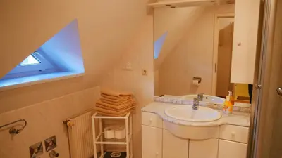 Ein Badezimmer in der Unterkunft Haus 