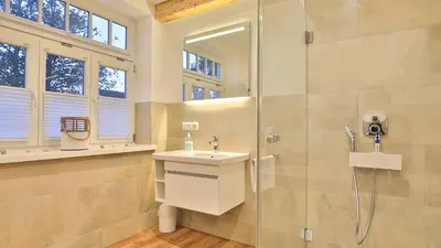Ein Badezimmer in der Unterkunft Mühlenhaus Tretmühle