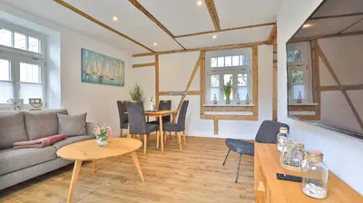 Ein Sitzbereich in der Unterkunft Mühlenhaus Tretmühle