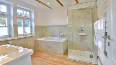 Ein Badezimmer in der Unterkunft Mühlenhaus Wassermühle