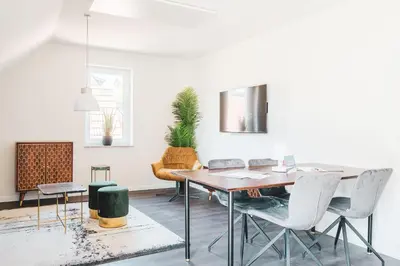 Ein Sitzbereich in der Unterkunft Dünenquartier Apartment 09