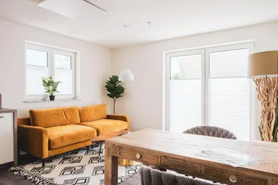 Ein Sitzbereich in der Unterkunft Dünenquartier Apartment 11
