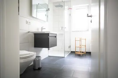 Ein Badezimmer in der Unterkunft Dünenquartier Apartment 12