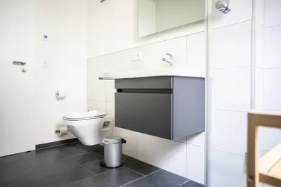Ein Badezimmer in der Unterkunft Dünenquartier Apartment 12