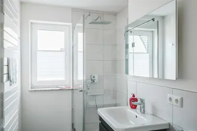 Ein Badezimmer in der Unterkunft Dünenquartier Apartment 13