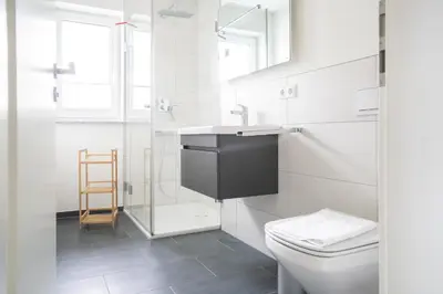 Ein Badezimmer in der Unterkunft Dünenquartier Apartment 14