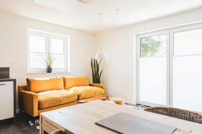 Ein Sitzbereich in der Unterkunft Dünenquartier Apartment 15
