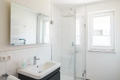 Ein Badezimmer in der Unterkunft Dünenquartier Apartment 16
