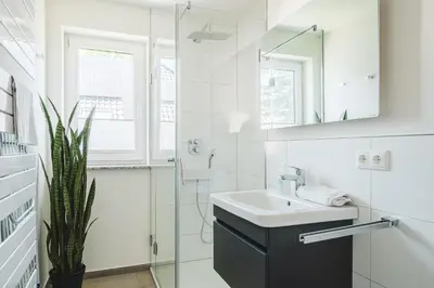 Ein Badezimmer in der Unterkunft Dünenquartier Apartment 18