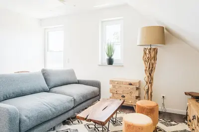 Ein Sitzbereich in der Unterkunft Dünenquartier Apartment 18