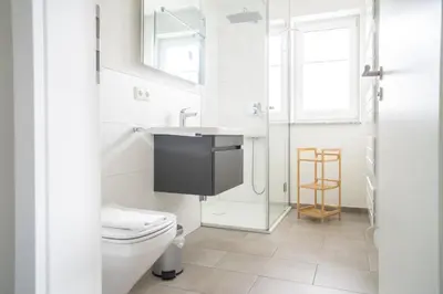 Ein Badezimmer in der Unterkunft Dünenquartier Apartment 25
