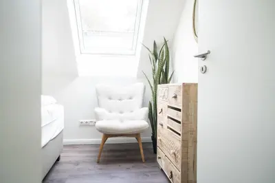 Ein Sitzbereich in der Unterkunft Dünenquartier Apartment 26