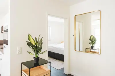 Ein Bett oder Betten in einem Zimmer der Unterkunft Dünenquartier Apartment 27