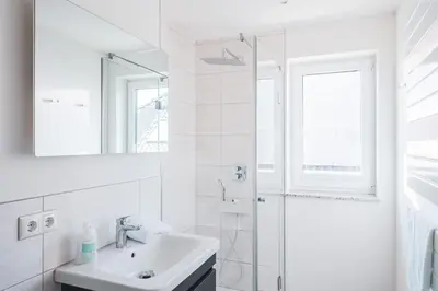 Ein Badezimmer in der Unterkunft Dünenquartier Apartment 29
