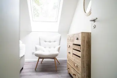 Ein Sitzbereich in der Unterkunft Dünenquartier Apartment 30