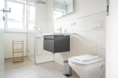 Ein Badezimmer in der Unterkunft Dünenquartier Apartment 30