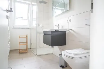 Ein Badezimmer in der Unterkunft Dünenquartier Apartment 30