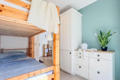 Ein Bett oder Betten in einem Zimmer der Unterkunft Seeluft 4