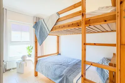 Ein Bett oder Betten in einem Zimmer der Unterkunft Seeluft 4