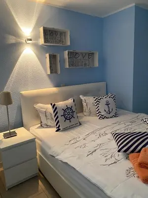 Ein Bett oder Betten in einem Zimmer der Unterkunft Seestraße 70, Ap 30