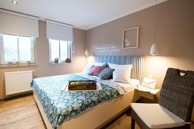Ein Bett oder Betten in einem Zimmer der Unterkunft Sonnendeck 08