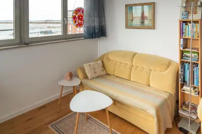 Ein Sitzbereich in der Unterkunft Ferienwohnung Kiek ut