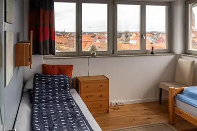 Ein Bett oder Betten in einem Zimmer der Unterkunft Ferienwohnung Kiek ut