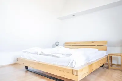 Ein Bett oder Betten in einem Zimmer der Unterkunft Kranichhus Kranich 3