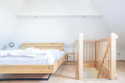Ein Bett oder Betten in einem Zimmer der Unterkunft Kranichhus Kranich 3